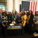Governor Kathy Hochul, alongside local leaders, signed legislation in late 2023 to officially establish the reparations task force. (Governor’s Office/Flickr)