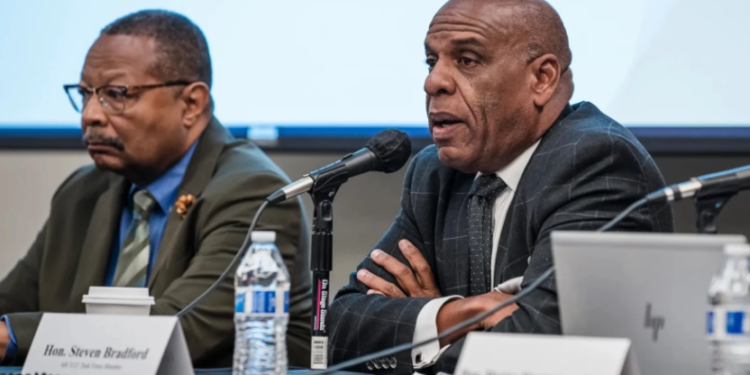 Ariana Drehsler / CalMatters State Senator Steven Bradford, pictured on the right, addresses the Reparations Task Force Meeting at San Diego State on January 28, 2023.