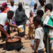 A volunteer stirs food prepared for distribution to people in Omdurman, Sudan, on September 3, 2023. (File photo: Reuters)