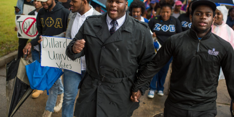 Students from Dillard University, a historically Black college in Louisiana, march to their polling station on November 8, 2016. (Photo by Tom Williams/Getty Images)