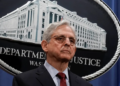 U.S. Attorney General Merrick Garland has announced that the Justice Department will be filing a lawsuit against Georgia’s election law, which introduces new restrictions on voting. [Ken Cedeno/Reuters]
