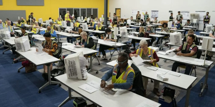 Absentee ballots are being prepared for mailing at the Wake County Board of Elections located in Raleigh, North Carolina. (Allison Joyce/Getty Images)
