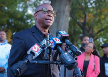 Rev. Kevin C. Peterson, founder of the New Democracy Coalition and the Faneuil Hall Race Initiative, spoke at a press conference in Boston's Roxbury neighborhood, where he introduced a proposal outlining how the City of Boston should implement reparations. (Rev. Kevin C. Peterson)