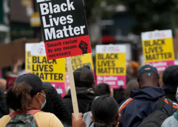 The U.K. government’s report on racism was commissioned in response to the large-scale Black Lives Matter protests that took place last summer. Frank Augstein/AP