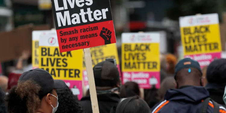 The U.K. government’s report on racism was commissioned in response to the large-scale Black Lives Matter protests that took place last summer. Frank Augstein/AP