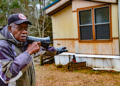 Willie Horstead Jr., an Army veteran, has spent years witnessing his mobile home gradually sink into the ground due to recurring flooding in Alabama's Shiloh community. — Credit: Lee Hedgepeth/InsideClimate News