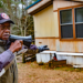 Willie Horstead Jr., an Army veteran, has spent years witnessing his mobile home gradually sink into the ground due to recurring flooding in Alabama's Shiloh community. — Credit: Lee Hedgepeth/InsideClimate News