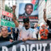 Families demand justice and reform following police killings in Michigan