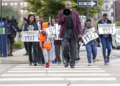 Reverend Robert Turner, from the historic Vernon African Methodist Episcopal (AME) Church, which was damaged during the 1921 Tulsa Race Massacre, leads a weekly pilgrimage to Tulsa City Hall every Wednesday, calling for "reparations now" as part of a reconciliatory effort. © 2019 Ian Maule/Tulsa World.