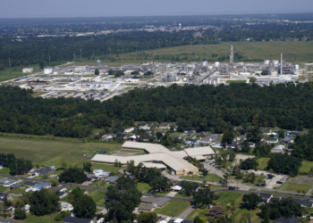 The Fifth Ward Elementary School and nearby residential neighborhoods are located close to the Denka Performance Elastomer Plant in Reserve, Louisiana, shown here on Sept. 23, 2022. (AP Photo/Gerald Herbert, File)