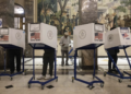 On Election Day, Tuesday, Nov. 5, 2024, voters cast their ballots at the Bronx County Supreme Court in New York. (AP Photo/Yuki Iwamura)