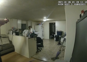 This body camera footage, released by the Illinois State Police on Monday, July 22, 2024, shows former Sangamon County Sheriff’s Deputy Sean Grayson aiming his gun at Sonya Massey, who had called 911 for assistance. The incident occurred inside Massey’s Springfield, Illinois, home on July 6, 2024, and ended with Grayson fatally shooting her. (Illinois State Police via AP)