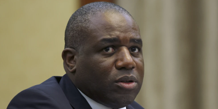 Britain’s Foreign Secretary David Lammy meets with Chinese Vice Premier Ding Xuexiang at Beijing’s Great Hall of the People on Friday, Oct. 18, 2024. (Florence Lo/Pool Photo via AP)