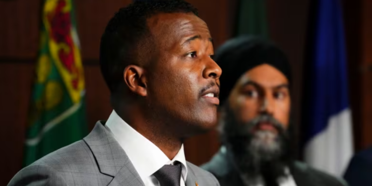 Nicholas Marcus Thompson, CEO of the Black Class Action Secretariat, addresses the media during a press conference on Parliament Hill in Ottawa, Wednesday, September 28, 2022. (Sean Kilpatrick/The Canadian Press)