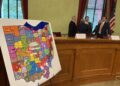 Republican members of the Ohio Redistricting Commission converse ahead of a 2023 public hearing on State House district maps. (Photo by Susan Tebben, Ohio Capital Journal.)