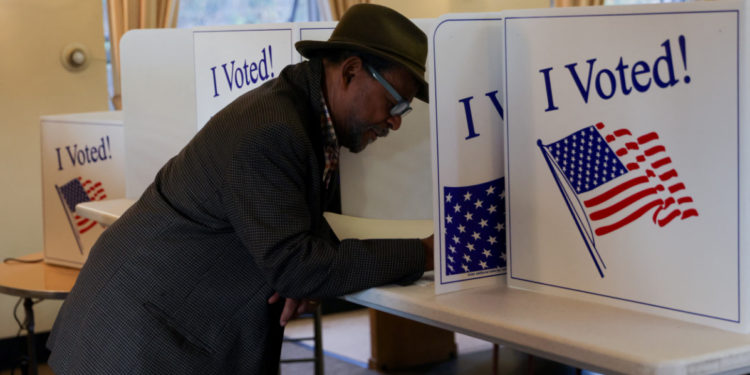 A voter casts his ballot on Election Day during the 2024 U.S. presidential election at a library in Pittsburgh, Pennsylvania, on November 5, 2024. (REUTERS/Jeenah Moon - Purchase Licensing Rights)