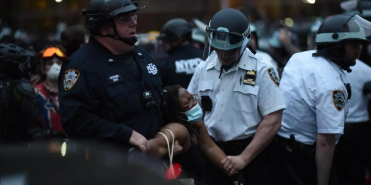 During a peaceful protest in Mott Haven on June 4, 2020, New York City police officers reportedly trapped, assaulted, and arrested over 250 demonstrators. © 2020 C.S. Muncy