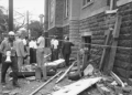 In this Sept. 15, 1963 file photo, investigators are seen outside the 16th Street Baptist Church in Birmingham, Alabama, after a bombing that claimed the lives of four young girls. Years later, three members of the Ku Klux Klan were convicted for their involvement in the attack. (AP Photo/File)