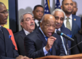 Rep. John Lewis (D-Ga.) endorsed Hillary Clinton alongside the Congressional Black Caucus Political Action Committee on February 11, 2016. The endorsement event was captured in a photograph by J. Scott Applewhite for the Associated Press.