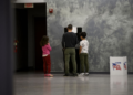 A voter casts their ballot at the Owen Jax Community Center in Warren, Michigan, on Election Day, November 5, 2024. (Photo by Brittany Greeson for Votebeat)