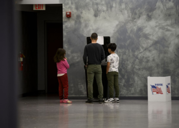 A voter casts their ballot at the Owen Jax Community Center in Warren, Michigan, on Election Day, November 5, 2024. (Photo by Brittany Greeson for Votebeat)