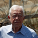 Former U.S. President Jimmy Carter is pictured standing before the contentious Israeli barrier during his visit to the West Bank village of Bilin near Ramallah on August 27, 2009. REUTERS/Ammar Awad/File Photo. Purchase Licensing Rights.