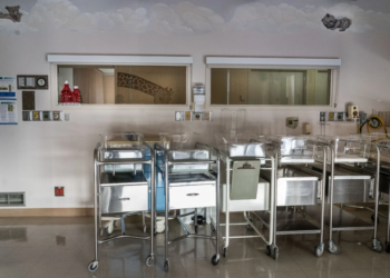 Empty infant cribs remain unused at Madera Community Hospital in Madera, California, which ceased operations in January 2023. (Photo by Melina Mara/The Washington Post via Getty Images)