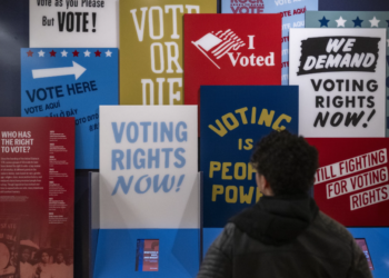 A visitor explores a voting rights exhibit at the International African American Museum in Charleston, South Carolina, January 2024. Jim Watson, AFP/Getty Images: