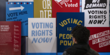 A visitor explores a voting rights exhibit at the International African American Museum in Charleston, South Carolina, January 2024. Jim Watson, AFP/Getty Images: