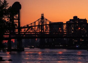 silhouette of bridge during sunset