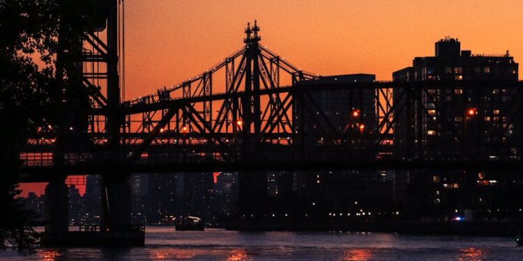 silhouette of bridge during sunset