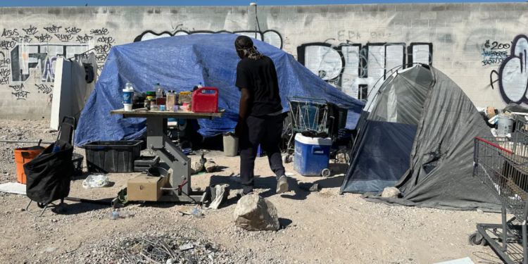 Maurice Clark, currently homeless on the streets of Las Vegas, completed a survey that could assist him in securing housing. However, he remains in limbo, waiting for the next steps. (Angela Hart/KFF Health News)