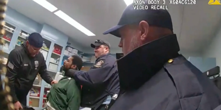 A still from bodycam footage shows corrections officers surrounding 43-year-old Robert Brooks, who was handcuffed, at Marcy Correctional Facility in Oneida County, N.Y., on December 9. The footage captures several officers assaulting him, punching and choking him while he appears semi-conscious. (Photo: Office of the New York State Attorney General)