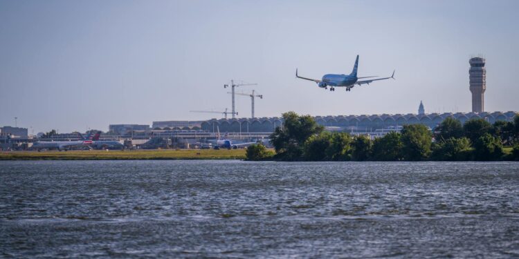 an airplane approaching an airport for landing