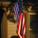 american flag in sunlight outside kansas home