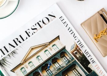 stylish flat lay with charleston magazine