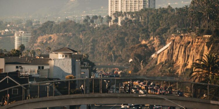 busy highway traffic with scenic mountain views