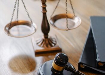 judges desk with gavel and scales