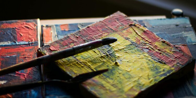 pen on yellow and red board