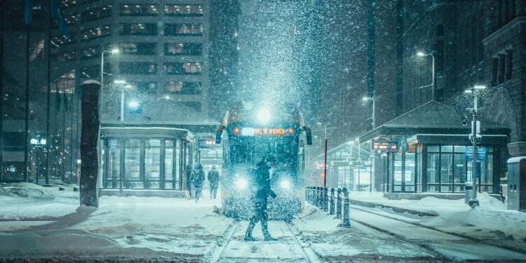 person standing in front of a train
