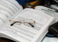 eyeglasses on an opened book