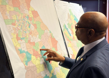 Georgia Representative Mack Jackson, D-Sandersville, examines a map of proposed state House districts ahead of a House hearing on November 29, 2023, at the state Capitol in Atlanta. (AP Photo/Jeff Amy, File) Drew Angerer / Drew Angerer
