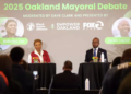 Barbara Lee and Loren Taylor engage in an Oakland mayoral debate at Town Fare at OMCA on Tuesday. (Scott Strazzante / S.F. Chronicle)