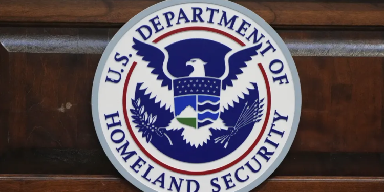 The seal of the Department of Homeland Security is displayed as Homeland Security Secretary Kristi Noem visits U.S. Coast Guard Air Station Kodiak on Monday, March 17, 2025, in Kodiak, Alaska. (AP Photo/Alex Brandon)