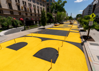 FILE – The "Black Lives Matter" lettering at Black Lives Matter Plaza was repainted after the street near the White House in Washington was resurfaced on May 13, 2021. (AP Photo/Andrew Harnik, file)