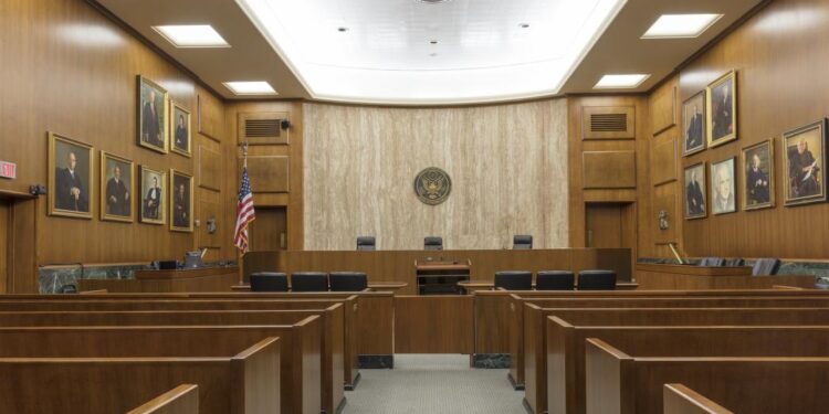 2 officials fired by Trump return to court to challenge his power